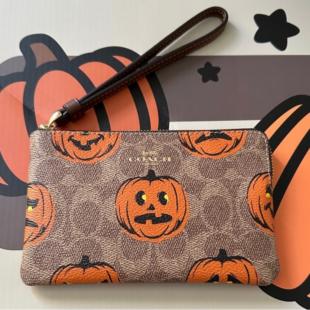 Coach Brown and Orange Pumpkin Wristlet